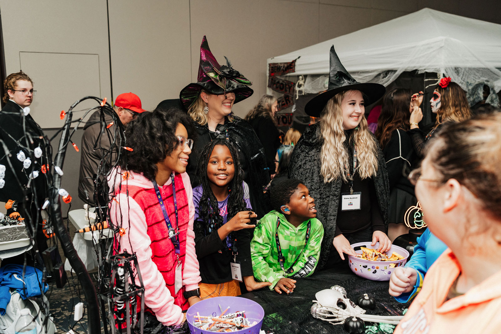 Children and volunteers in costume at UM-Flint Inclusive Halloween celebration.